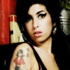 Amy Winehouse si cele 11 pisici